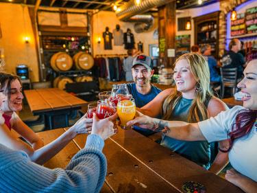 friends gathering at atypical brewery & barrelworks photo